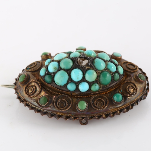 140 - A 19th century 15ct gold turquoise and diamond bombe memorial brooch, set with cabochon turquoise ro... 