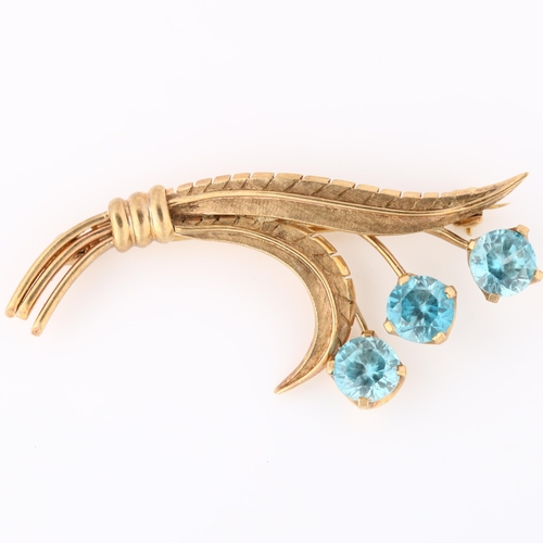 142 - A late 20th century 9ct rose gold blue zircon floral spray brooch, maker's marks TF and S, brooch le... 