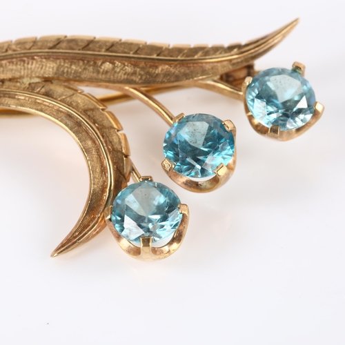 142 - A late 20th century 9ct rose gold blue zircon floral spray brooch, maker's marks TF and S, brooch le... 