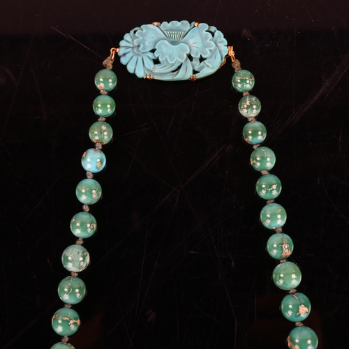 148 - An Antique graduated turquoise bead necklace, on individually knotted string on French gold-mounted ... 