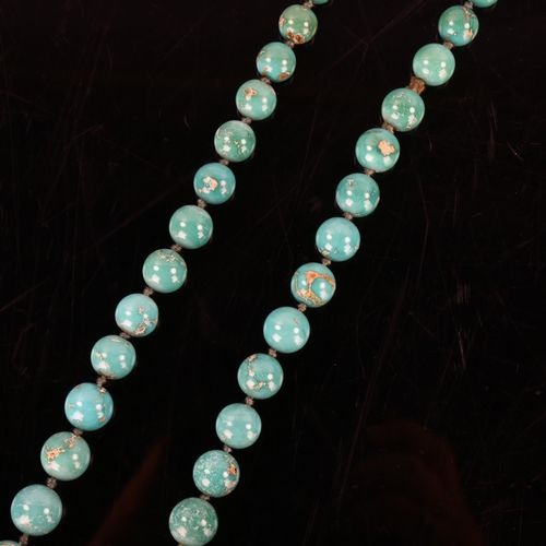 148 - An Antique graduated turquoise bead necklace, on individually knotted string on French gold-mounted ... 