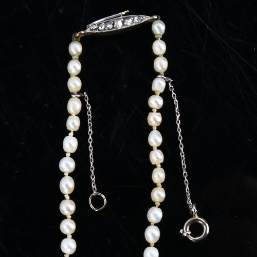 154 - A single-strand graduated pearl necklace, with 18ct gold rose-cut diamond set clasp, pearls measure ... 