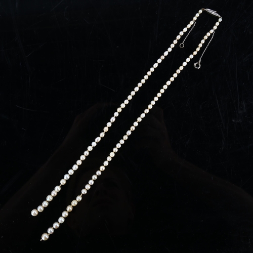 154 - A single-strand graduated pearl necklace, with 18ct gold rose-cut diamond set clasp, pearls measure ... 