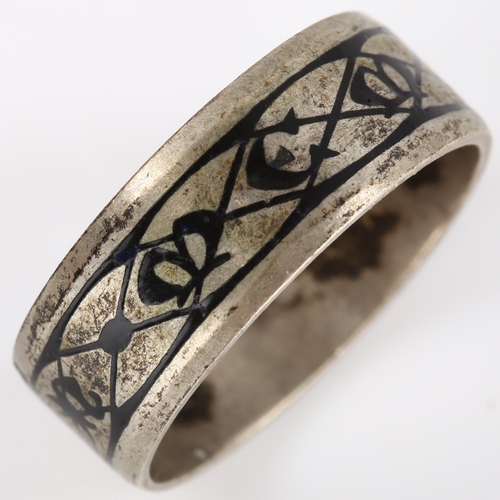 165 - A Victorian silver memorial band ring, with black enamel decoration, inscribed 