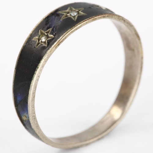 166 - A Victorian pearl memorial ring, unmarked white metal settings with black enamel decoration and star... 