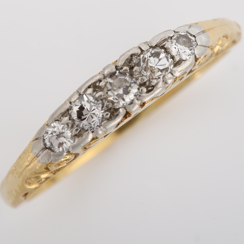 167 - An early 20th century 18ct gold graduated five stone half hoop ring, set with old-cut diamonds, tota... 