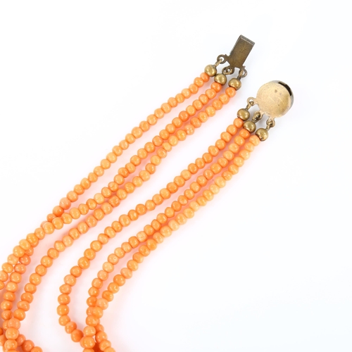 168 - A triple-strand graduated coral bead necklace, with gilt-metal clasp, beads ranging from 2.6mm to 6.... 