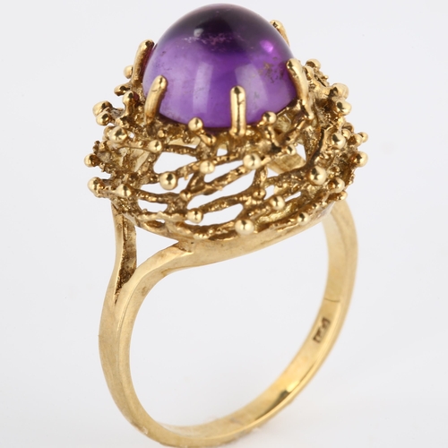 169 - A late 20th century 9ct gold amethyst bird's nest ring, set with round high cabochon amethyst within... 