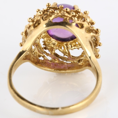 169 - A late 20th century 9ct gold amethyst bird's nest ring, set with round high cabochon amethyst within... 