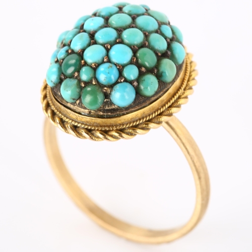 170 - An Antique turquoise bombe ring, unmarked gold settings with round cabochon turquoise and rope twist... 