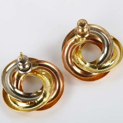 171 - A pair of Italian 18ct three-colour gold trinity earrings, with textured and polished decoration and... 