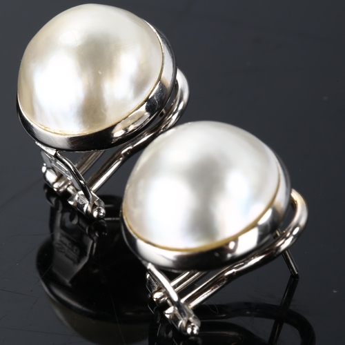 179 - A pair of Italian 18ct white gold Mabe pearl earrings, with clip and post fittings, earring diameter... 