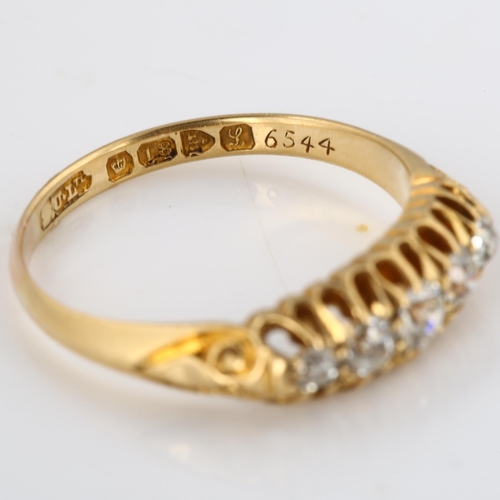 184 - An early 20th century 18ct gold graduated five stone diamond half hoop ring, set with old European-c... 