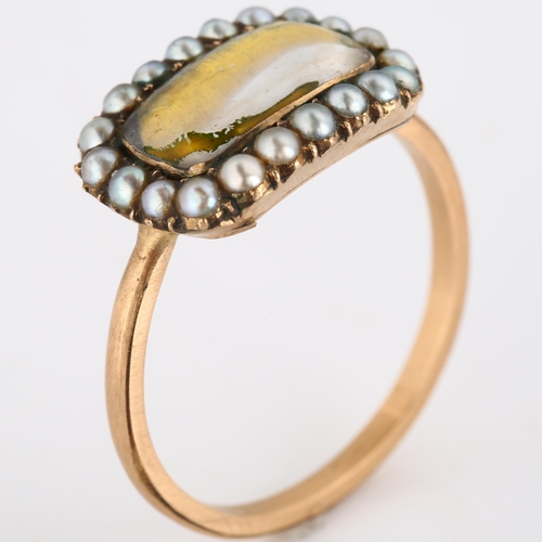 185 - An Antique foil-backed crystal and pearl cluster memorial ring, unmarked rose gold settings with vac... 