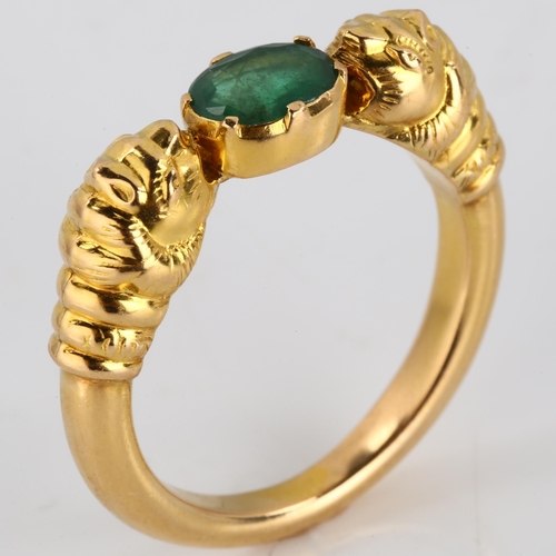 186 - A large 18ct gold emerald lion-head ring, after the Ancient Greek design, set with oval mixed-cut em... 