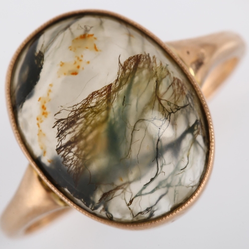 197 - An Antique 9ct rose gold moss agate dress ring, set with oval cabochon agate, setting height 16.4mm,... 