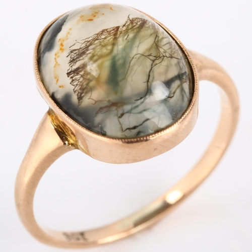 197 - An Antique 9ct rose gold moss agate dress ring, set with oval cabochon agate, setting height 16.4mm,... 