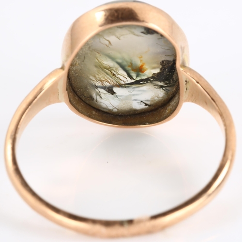 197 - An Antique 9ct rose gold moss agate dress ring, set with oval cabochon agate, setting height 16.4mm,... 