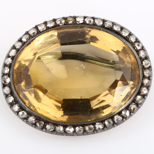 200 - A 19th century citrine and diamond cluster brooch, unmarked rose gold and silver settings with large... 