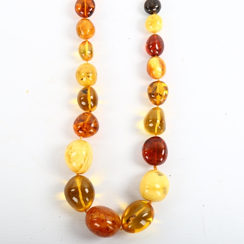 208 - A large graduated specimen amber bead necklace, beads ranging from 13mm to 35.6mm, necklace length 8... 