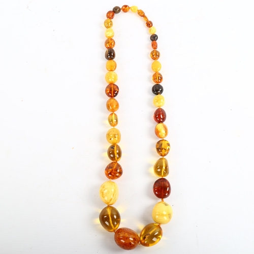 208 - A large graduated specimen amber bead necklace, beads ranging from 13mm to 35.6mm, necklace length 8... 