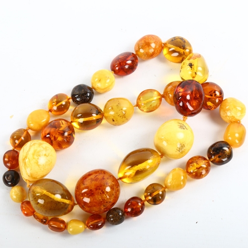 208 - A large graduated specimen amber bead necklace, beads ranging from 13mm to 35.6mm, necklace length 8... 