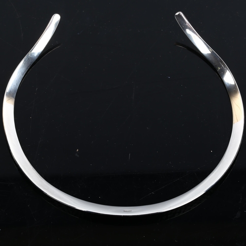 214 - NIELS ERIK FROM - a Danish sterling silver modernist neck torque, hand planished decoration, interna... 