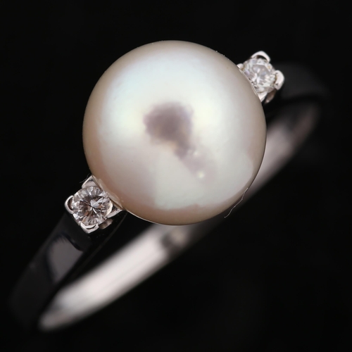 223 - A 1970s 18ct white gold whole pearl and diamond dress ring, set with modern round brilliant-cut diam... 