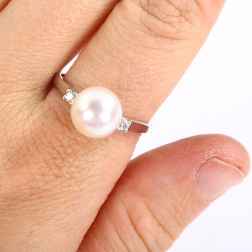 223 - A 1970s 18ct white gold whole pearl and diamond dress ring, set with modern round brilliant-cut diam... 