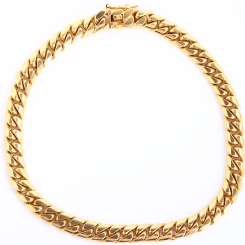 225 - A Chinese 18ct gold flat curb link chain bracelet, length 18cm, 19.4g