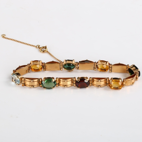 227 - A Continental 18ct rose gold gem set line bracelet, set with oval mixed-cut gemstones, including gar... 