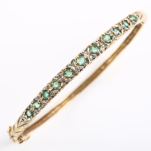 231 - A 9ct gold emerald and diamond hinged bangle, set with round-cut emerald and single-cut diamonds, ba... 