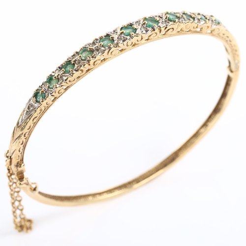 231 - A 9ct gold emerald and diamond hinged bangle, set with round-cut emerald and single-cut diamonds, ba... 