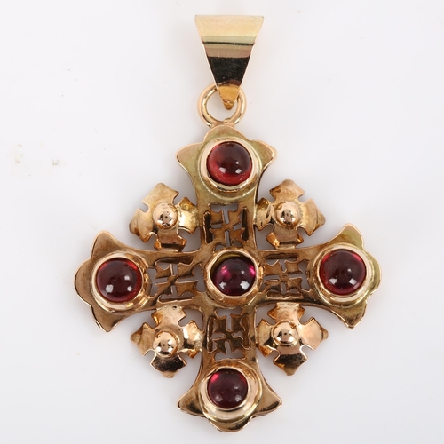 232 - A Byzantine garnet cross pendant, unmarked rose gold settings test as 9ct set with round cabochon ga... 