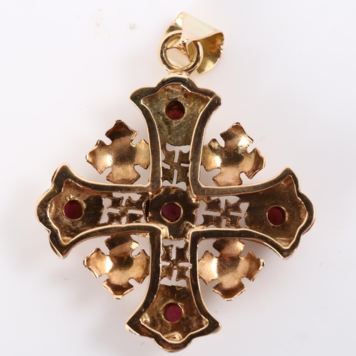 232 - A Byzantine garnet cross pendant, unmarked rose gold settings test as 9ct set with round cabochon ga... 