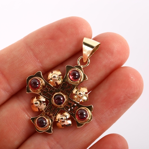 232 - A Byzantine garnet cross pendant, unmarked rose gold settings test as 9ct set with round cabochon ga... 