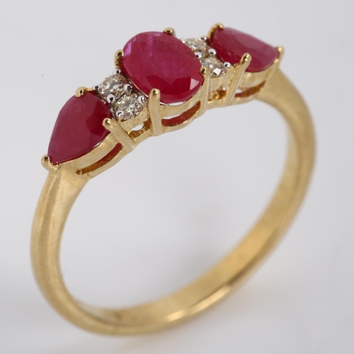 233 - A 9ct gold ruby and diamond dress ring, set with oval mixed and pear-cut rubies and modern round bri... 