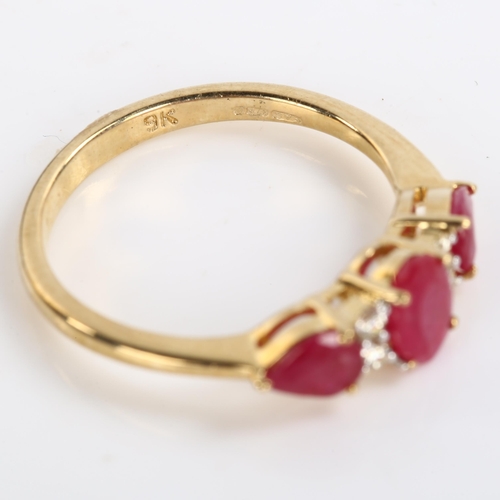 233 - A 9ct gold ruby and diamond dress ring, set with oval mixed and pear-cut rubies and modern round bri... 