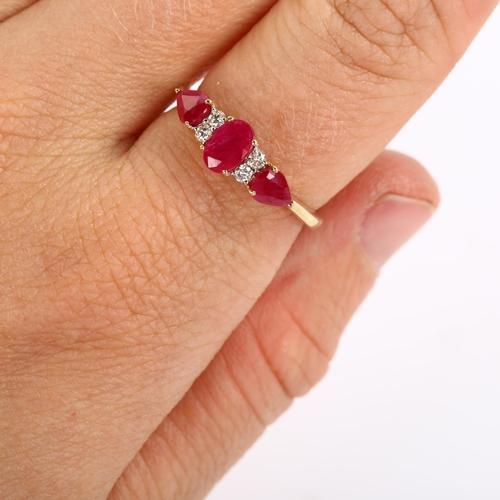 233 - A 9ct gold ruby and diamond dress ring, set with oval mixed and pear-cut rubies and modern round bri... 