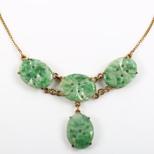 241 - A Chinese 9ct gold jade panel necklace, on 9ct fine flat curb link chain, panel length 16.5mm, neckl... 