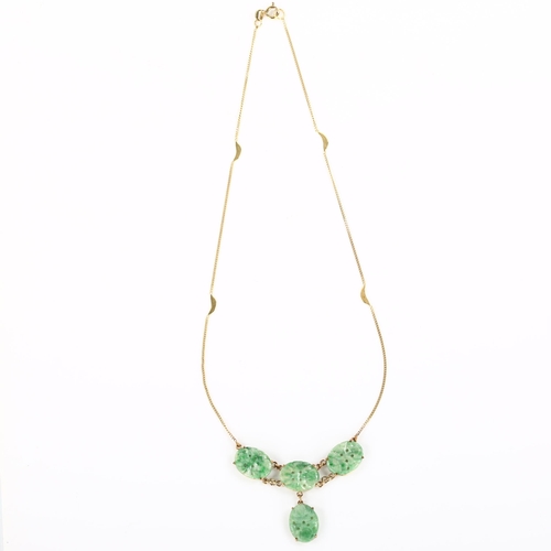 241 - A Chinese 9ct gold jade panel necklace, on 9ct fine flat curb link chain, panel length 16.5mm, neckl... 