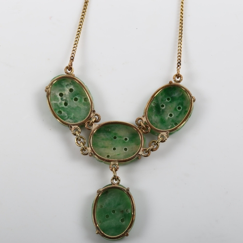 241 - A Chinese 9ct gold jade panel necklace, on 9ct fine flat curb link chain, panel length 16.5mm, neckl... 