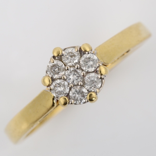 249 - A modern 18ct gold diamond cluster ring, set with modern round brilliant-cut diamonds, total diamond... 