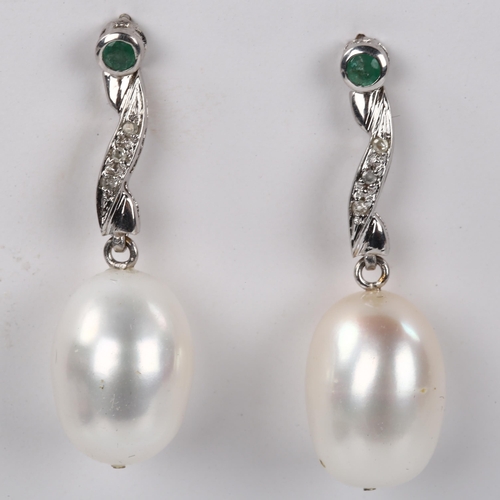 250 - A pair of pearl emerald and diamond drop earrings, unmarked white metal settings, earring height 34m... 