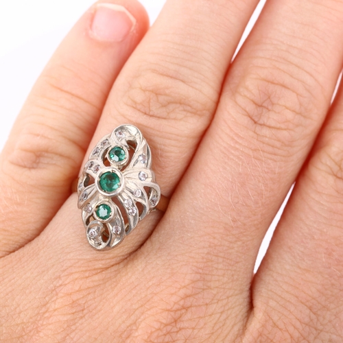 251 - An emerald and white sapphire cocktail ring, unmarked gold and silver settings, setting height 21.2m... 