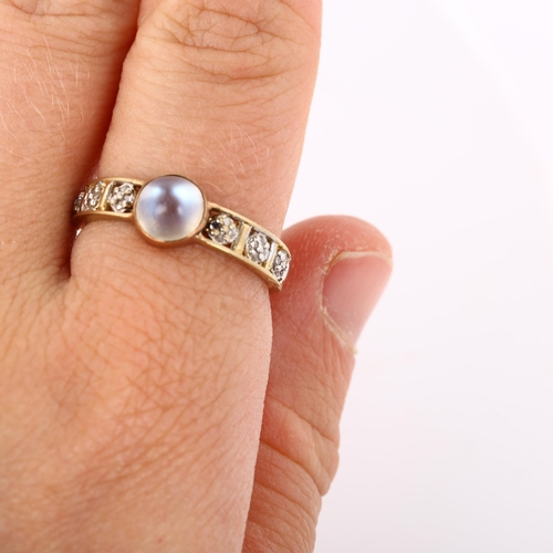 255 - A modern 9ct gold moonstone and diamond dress ring, set with round high cabochon moonstone and singl... 