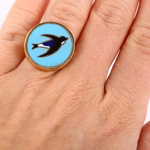 256 - A modern enamel house martin bird ring, unmarked silver-gilt settings, setting diameter 20.8mm, size... 