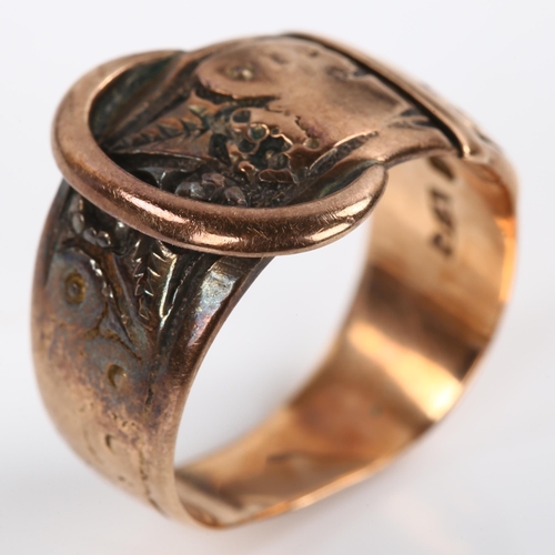 262 - An early 20th century 9ct rose gold belt buckle band ring, engraved floral decoration, maker's marks... 