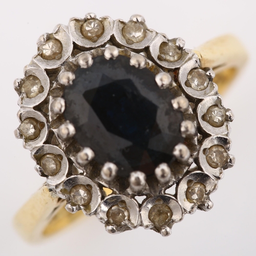 265 - A late 20th century 18ct gold sapphire and diamond cluster ring, set with oval mixed-cut sapphire an... 