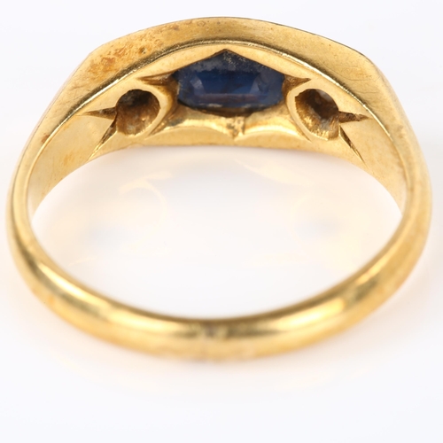 268 - A heavy three stone sapphire and diamond ring, unmarked gold settings with oval mixed-cut sapphire a... 